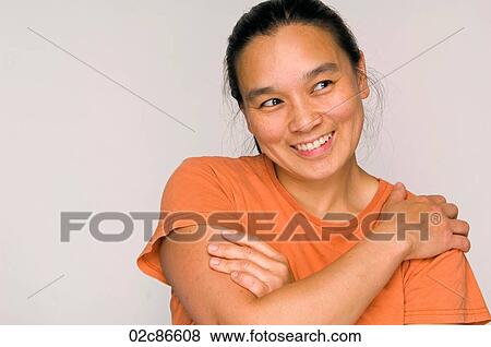 Portrait headshot of happy Asian woman smiling. View Large Photo Image Stock Photo - Portrait headshot of happy Asian woman smiling.. Fotosearch