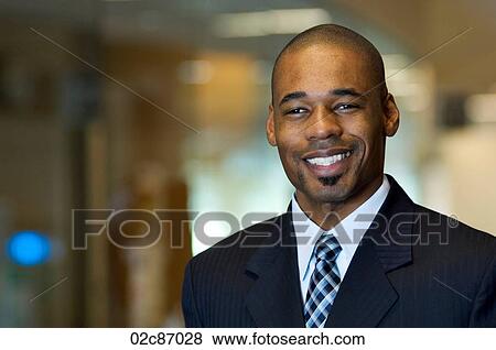 Stock Photo - Portrait of a African-American businessman.. Fotosearch