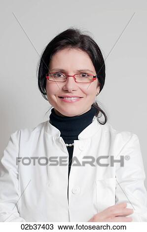 Portrait of a female doctor View Large Photo Image Stock Image - Portrait of a female doctor. Fotosearch