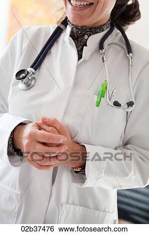 Stock Photograph - Portrait of a female doctor. Fotosearch