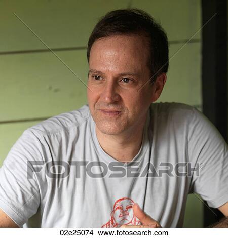 Portrait of a man looking into the distance. View Large Photo Image Picture - Portrait of a man looking into the distance. . Fotosearch