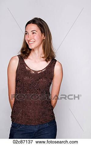 Portrait of a smiling young brunette woman. View Large Photo Image Stock Photo - Portrait of a smiling young brunette woman.. Fotosearch