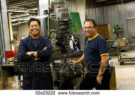 Portrait of Asian machinists in work shop. View Large Photo Image Stock Image - Portrait of Asian machinists in work shop.. Fotosearch