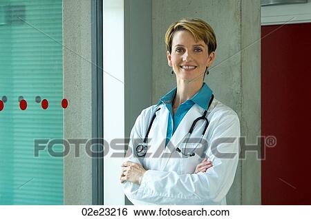 Portrait of friendly female family doctor. View Large Photo Image Stock Photograph - Portrait of friendly female family doctor.. Fotosearch