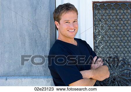 Stock Image - Portrait of smiling man.. Fotosearch