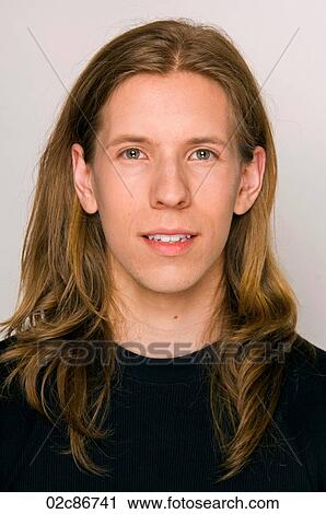 Portrait of young man with long hair. View Large Photo Image Stock Image - Portrait of young man with long hair.. Fotosearch