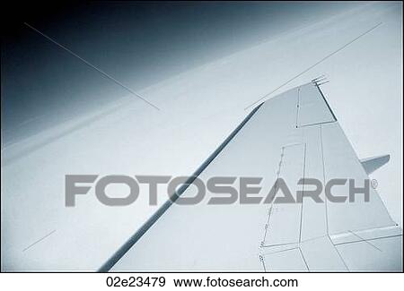 Private jet wing above the clouds. View Large Photo Image Stock Photo - Private jet wing above the clouds.. Fotosearch