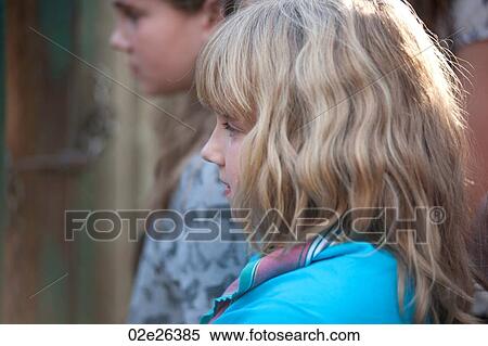 Profile of blond girl View Large Photo Image Stock Photography - Profile of blond girl. Fotosearch