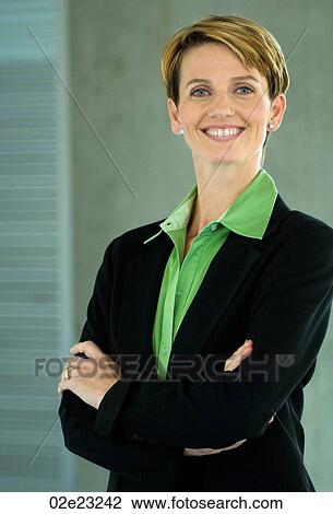 Stock Image - Proud successful business woman.. Fotosearch