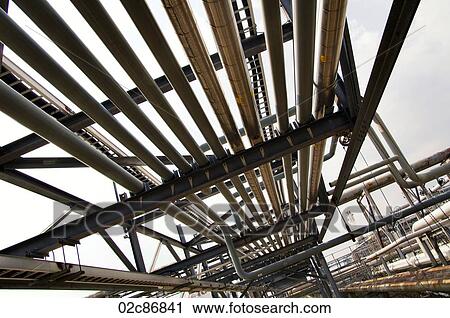 Receding piping at an oil and gas refinery. View Large Photo Image Stock Image - Receding piping at an oil and gas refinery.. Fotosearch