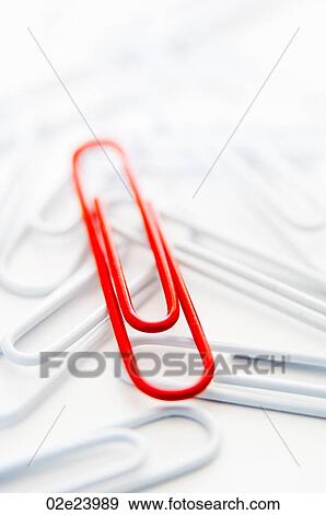 Red paper clip on top of clusters of white ones. View Large Photo Image Stock Photo - Red paper clip on top of clusters of white ones.. Fotosearch
