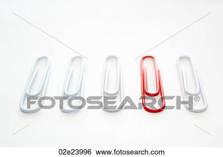 Red paper clip standing out from group of white ones. View Large Photo Image Stock Photograph - Red paper clip standing out from group of white ones.. Fotosearch