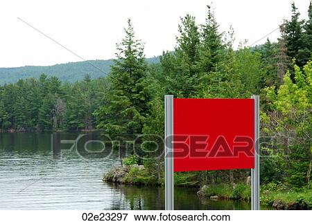 Red sign in natural lake environment. View Large Photo Image Stock Photo - Red sign in natural lake environment.. Fotosearch