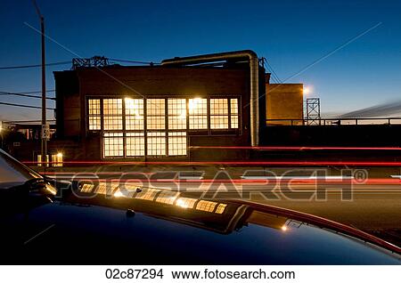 Reflecting and blurred lights in industrial setting. View Large Photo Image Picture - Reflecting and blurred lights in industrial setting.. Fotosearch