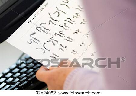 Researcher holding cytogenetic pictures of chromosomes. View Large Photo Image Stock Image - Researcher holding cytogenetic pictures of chromosomes.. Fotosearch