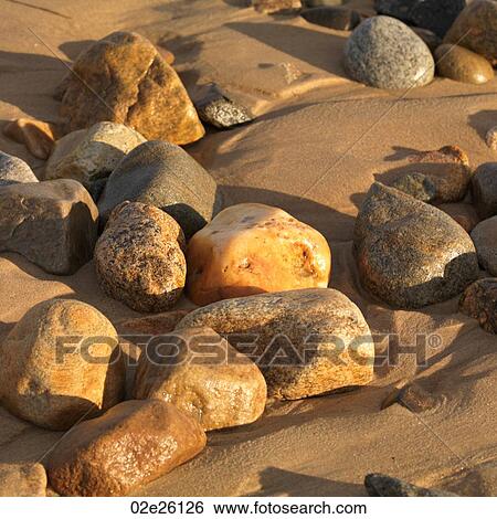 Rocks on the beach, The Hamptons, NY View Large Photo Image Stock Photograph - Rocks on the beach, The Hamptons, NY. Fotosearch