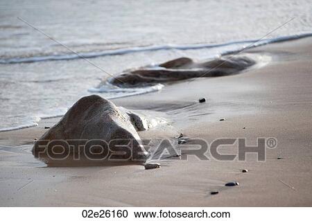 Rocks on the Hampton seashore View Large Photo Image Stock Image - Rocks on the Hampton seashore. Fotosearch