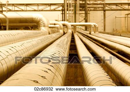 Row of metal piping ducts in industrial setting. View Large Photo Image Stock Image - Row of metal piping ducts in industrial setting.. Fotosearch