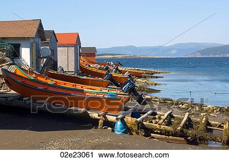 Row of orange fishing dories. View Large Photo Image Stock Image - Row of orange fishing dories.. Fotosearch