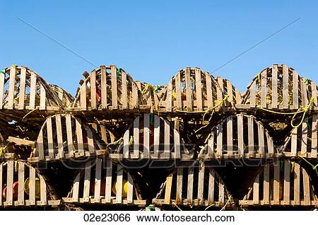 Rows of stacked lobster traps. View Large Photo Image Stock Photograph - Rows of stacked lobster traps.. Fotosearch
