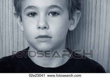 Sad face of a young boy. View Large Photo Image Stock Image - Sad face of a young boy.. Fotosearch