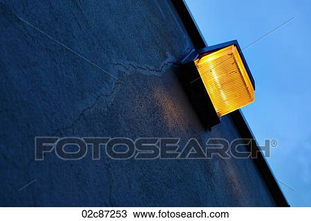 Safety light on cracked cement wall. View Large Photo Image Stock Image - Safety light on cracked cement wall.. Fotosearch