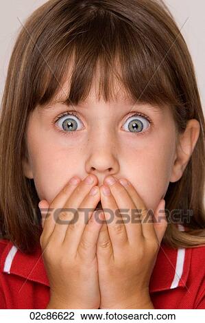 Scared six year old girl with hands covering mouth. View Large Photo Image Stock Image - Scared six year old girl with hands covering mouth.. Fotosearch