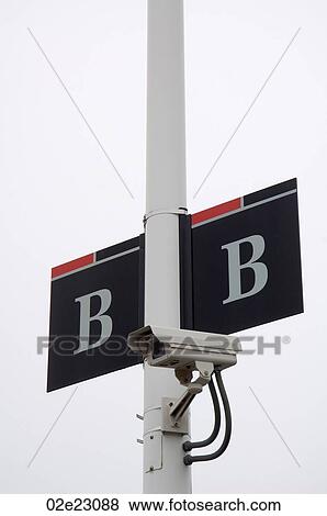 Stock Photo - Security camera in parking lot.. Fotosearch