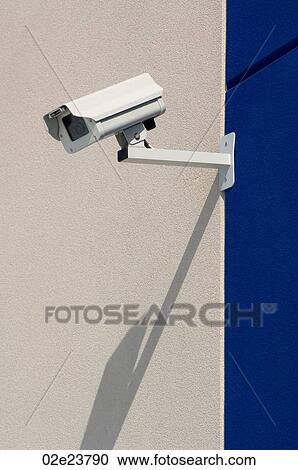 Security camera providing surveillance. View Large Photo Image Stock Image - Security camera providing surveillance.. Fotosearch