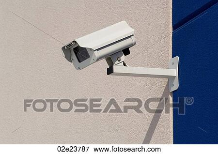 Security camera providing surveillance. View Large Photo Image Stock Photo - Security camera providing surveillance.. Fotosearch
