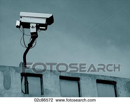 Security surveillance camera on rooftop of urban building. View Large Photo Image Stock Image - Security surveillance camera on rooftop of urban building.. Fotosearch