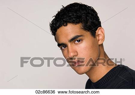 Stock Photograph - Serious teenage male.. Fotosearch