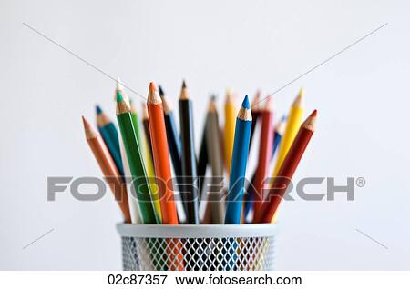 Sharpened colored pencils in pencil holder, on white background. View Large Photo Image Stock Photo - Sharpened colored pencils in pencil holder, on white background.. Fotosearch