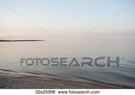 Shoreline of Lake Winnipeg in Gimli, Manitoba, Canada View Large Photo Image Stock Photograph - Shoreline of Lake Winnipeg in Gimli, Manitoba, Canada. Fotosearch