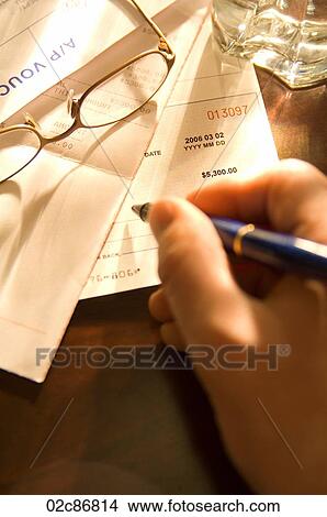 Signing corporate cheque. View Large Photo Image Picture - Signing corporate cheque.. Fotosearch