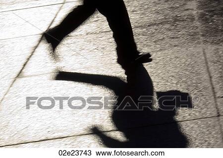 Silhouette of businessman running downtown. View Large Photo Image Stock Image - Silhouette of businessman running downtown.. Fotosearch