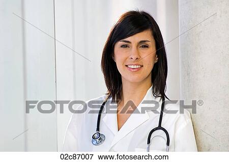 Smiling female family doctor. View Large Photo Image Stock Photo - Smiling female family doctor.. Fotosearch