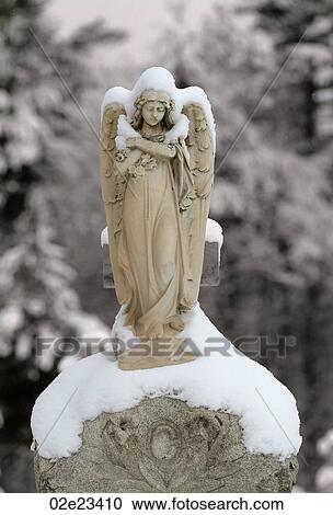 Snow covered stone angel. View Large Photo Image Stock Image - Snow covered stone angel.. Fotosearch