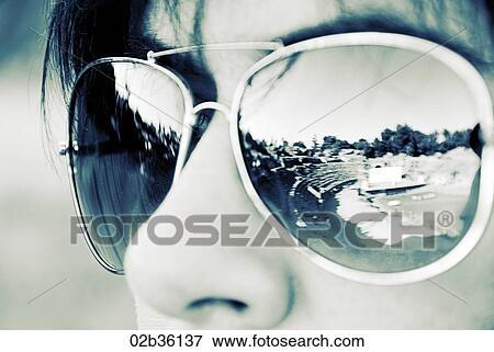 Spanish archaeological site reflected in woman's sunglasses View Large Photo Image Stock Photo - Spanish archaeological site reflected in woman's sunglasses. Fotosearch