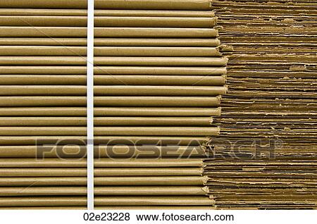 Stock Photo - Stack of corrugated cardboard.. Fotosearch