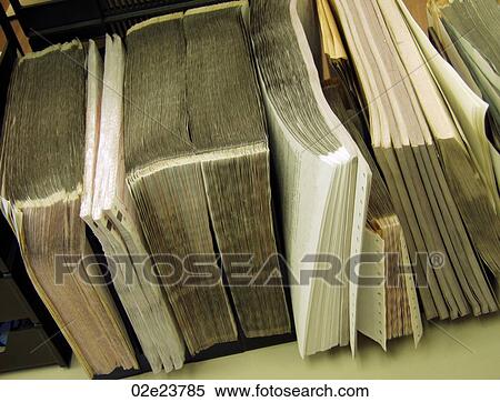 Stock Photography - Stacks of paper forms.. Fotosearch