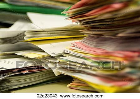 Stacks of paper ready to be filed. View Large Photo Image Stock Image - Stacks of paper ready to be filed.. Fotosearch