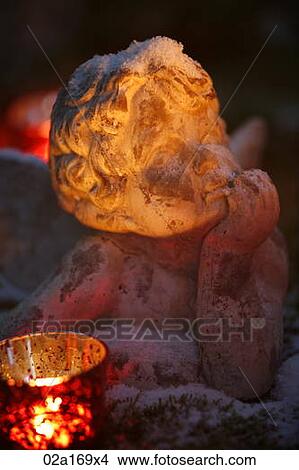 Statue of a cherub View Large Photo Image Picture - Statue of a cherub. Fotosearch