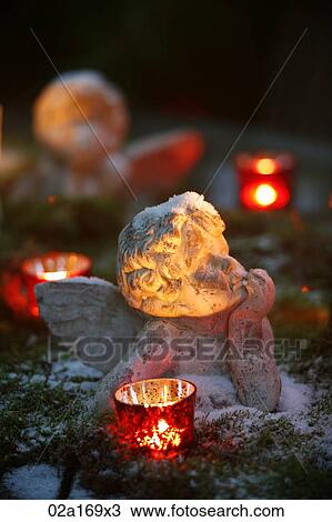 Statue of a cherub View Large Photo Image Stock Image - Statue of a cherub. Fotosearch