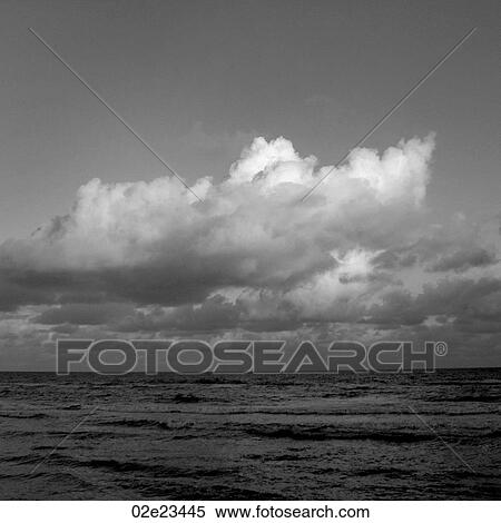 Stock Photography - Storm clouds forming over ocean.. Fotosearch