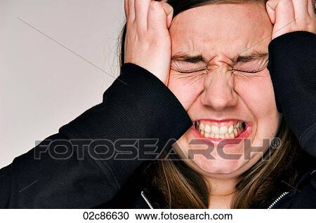 Stressed-out woman with hands to head. View Large Photo Image Stock Image - Stressed-out woman with hands to head.. Fotosearch