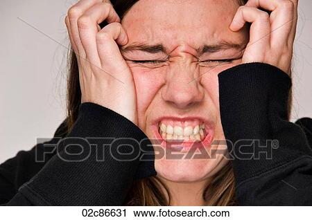 Stressed-out woman with hands to head. View Large Photo Image Stock Image - Stressed-out woman with hands to head.. Fotosearch