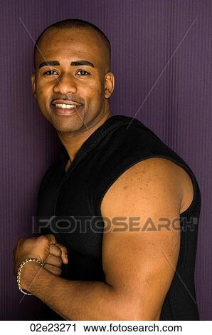 Strong african-american man posing in Photobooth. View Large Photo Image Stock Image - Strong african-american man posing in Photobooth.. Fotosearch