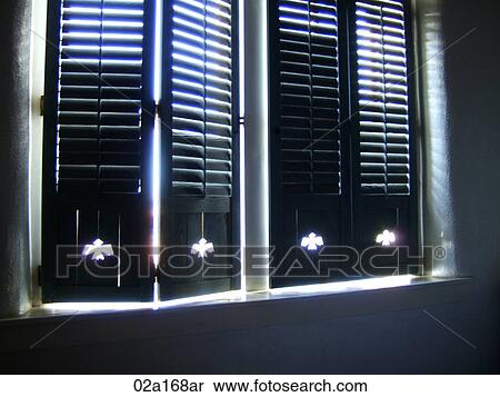 Sun shining through closed blinds View Large Photo Image Stock Photography - Sun shining through closed blinds. Fotosearch