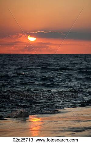 Stock Image - Sunset at Chicago, Lake Michigan. Fotosearch